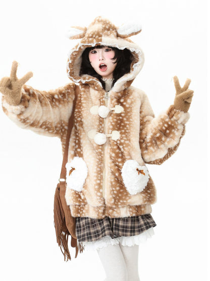 Person wearing a deer-themed hoodie with antlers on a white background