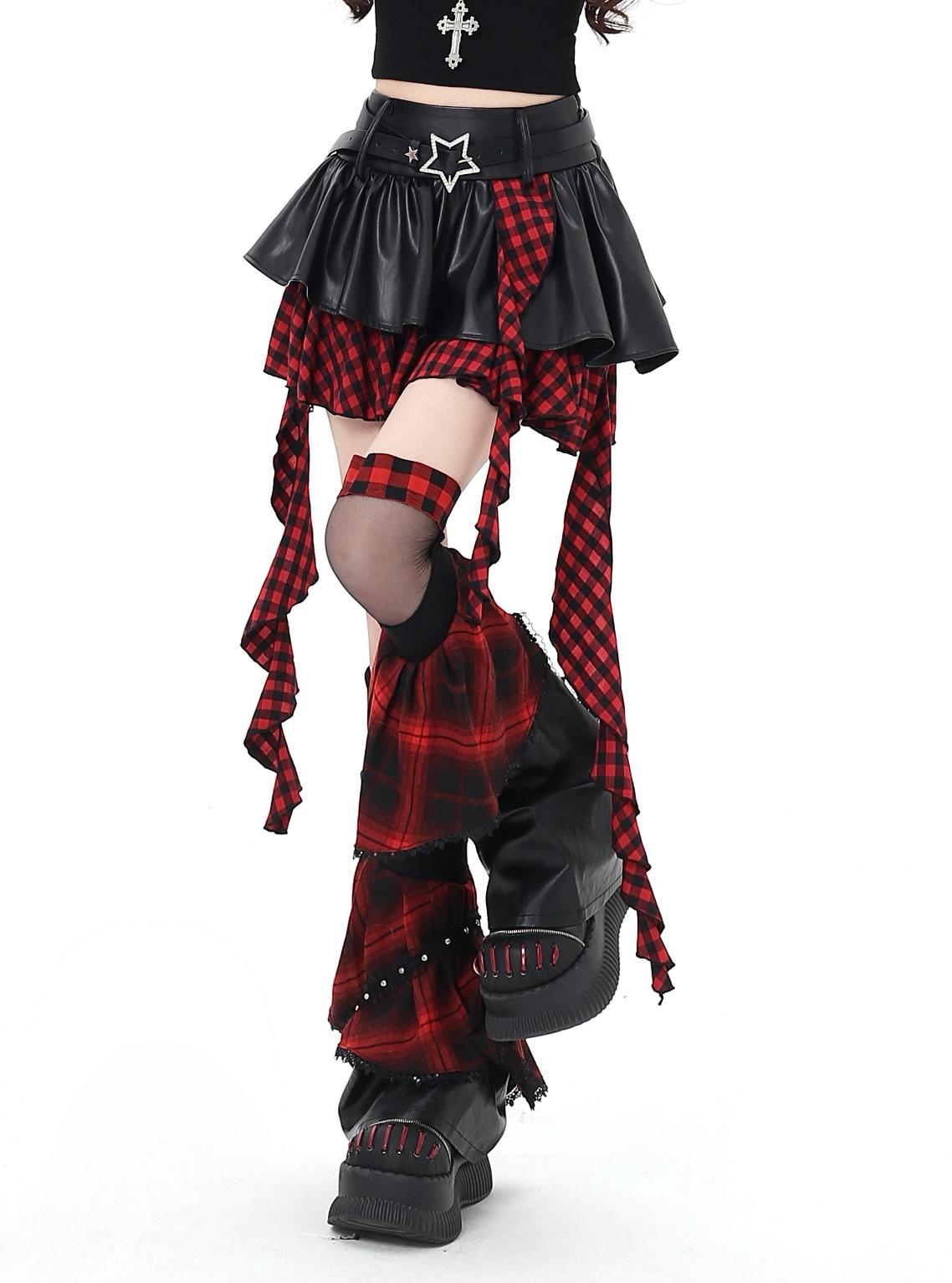 Gothic-style outfit with plaid skirt, black top, and red and black checkered pants on a white background
