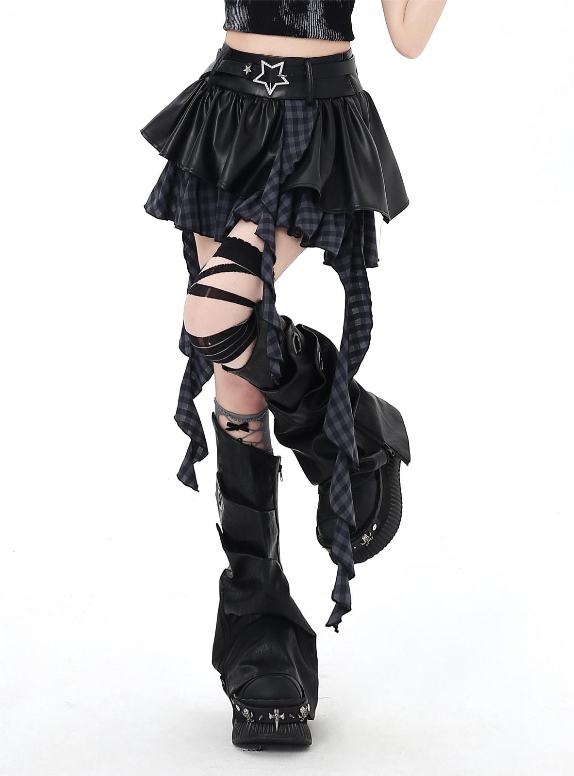 Black gothic-style skirt with plaid accents and knee-high boots on a white background