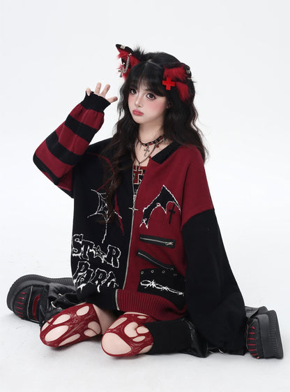 Person wearing a black and red outfit with decorative elements on a white background