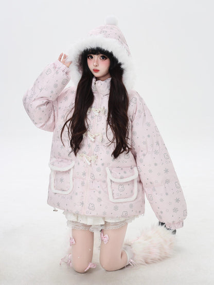 Person wearing a pink winter coat with fur trim on a white background