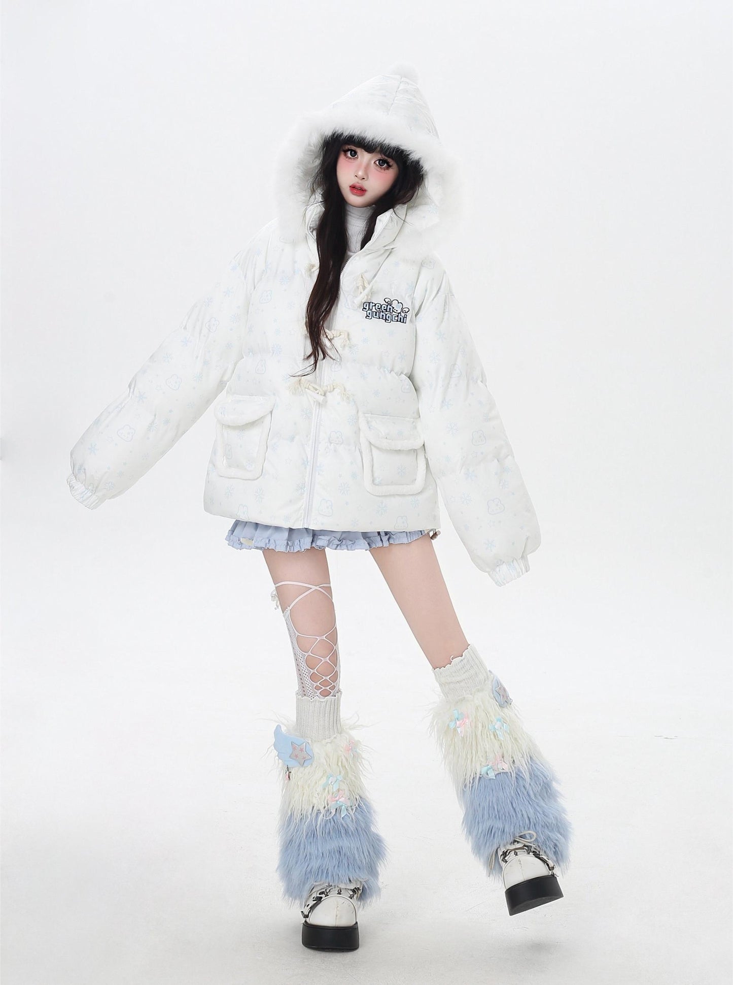 Person wearing a white puffer jacket with a hood on a white background