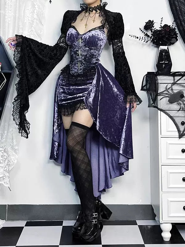 Person wearing a gothic-style outfit with a purple dress and black accessories in a decorated room.