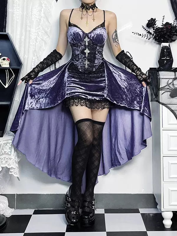 Person wearing a gothic-style outfit with a purple dress and black accessories in a decorated room.