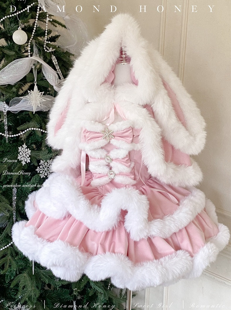 Pink skirt with white fur trim on a decorated Christmas tree