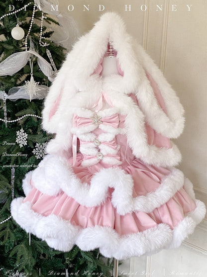 Pink skirt with white fur trim on a decorated Christmas tree