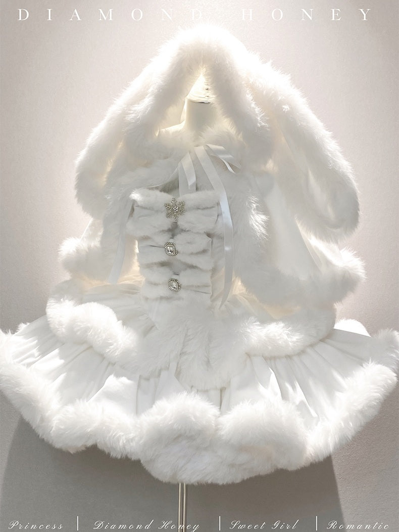 White fur coat with a large bow on a mannequin against a light background