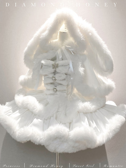 White fur coat with a large bow on a mannequin against a light background
