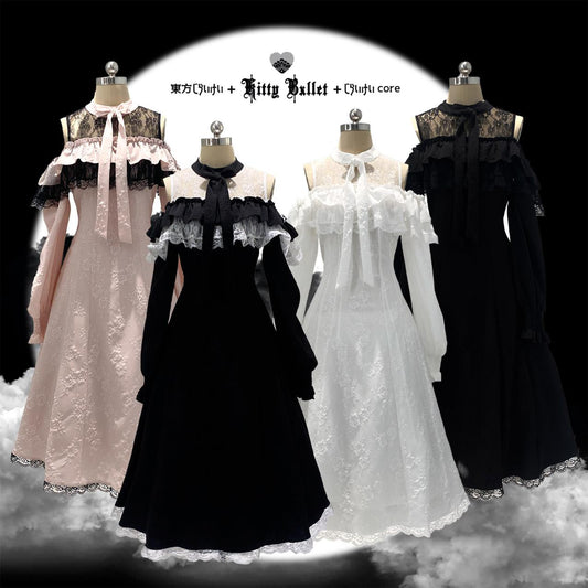 Four mannequins wearing jirai kei styles dresses with lace details on a black background.