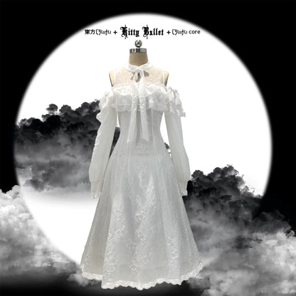 White lace dress on a mannequin against a black and white background with smoke effects.