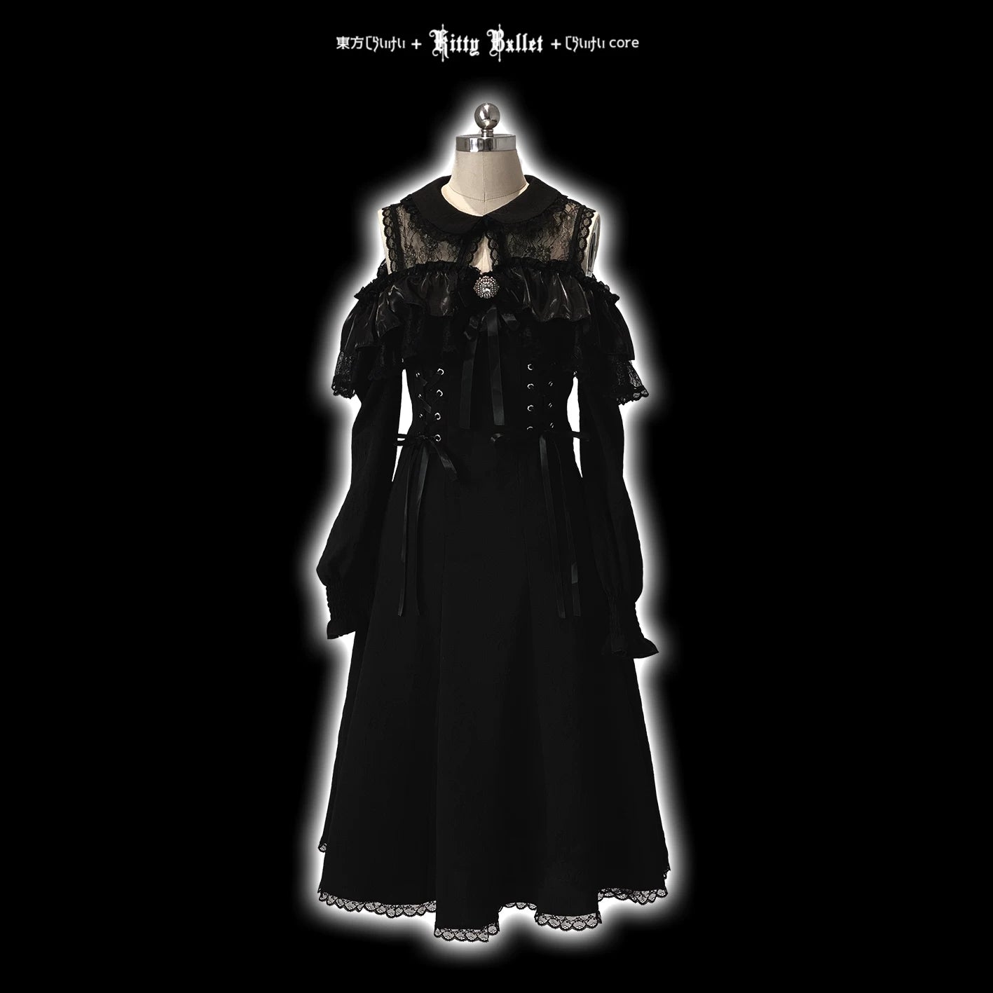 Black gothic-style dress on a mannequin against a black background