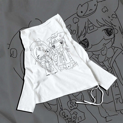 White shirt with anime character design on a gray background with cartoon elements.