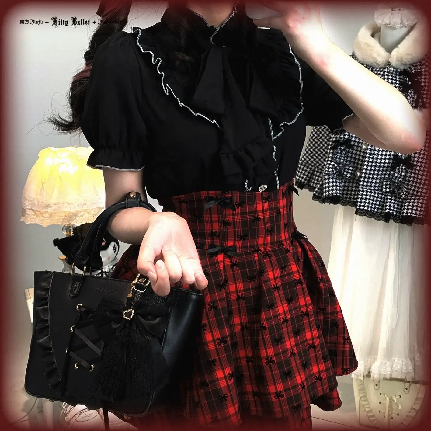 Person wearing a black top with ruffles and a red plaid skirt, holding a black handbag.