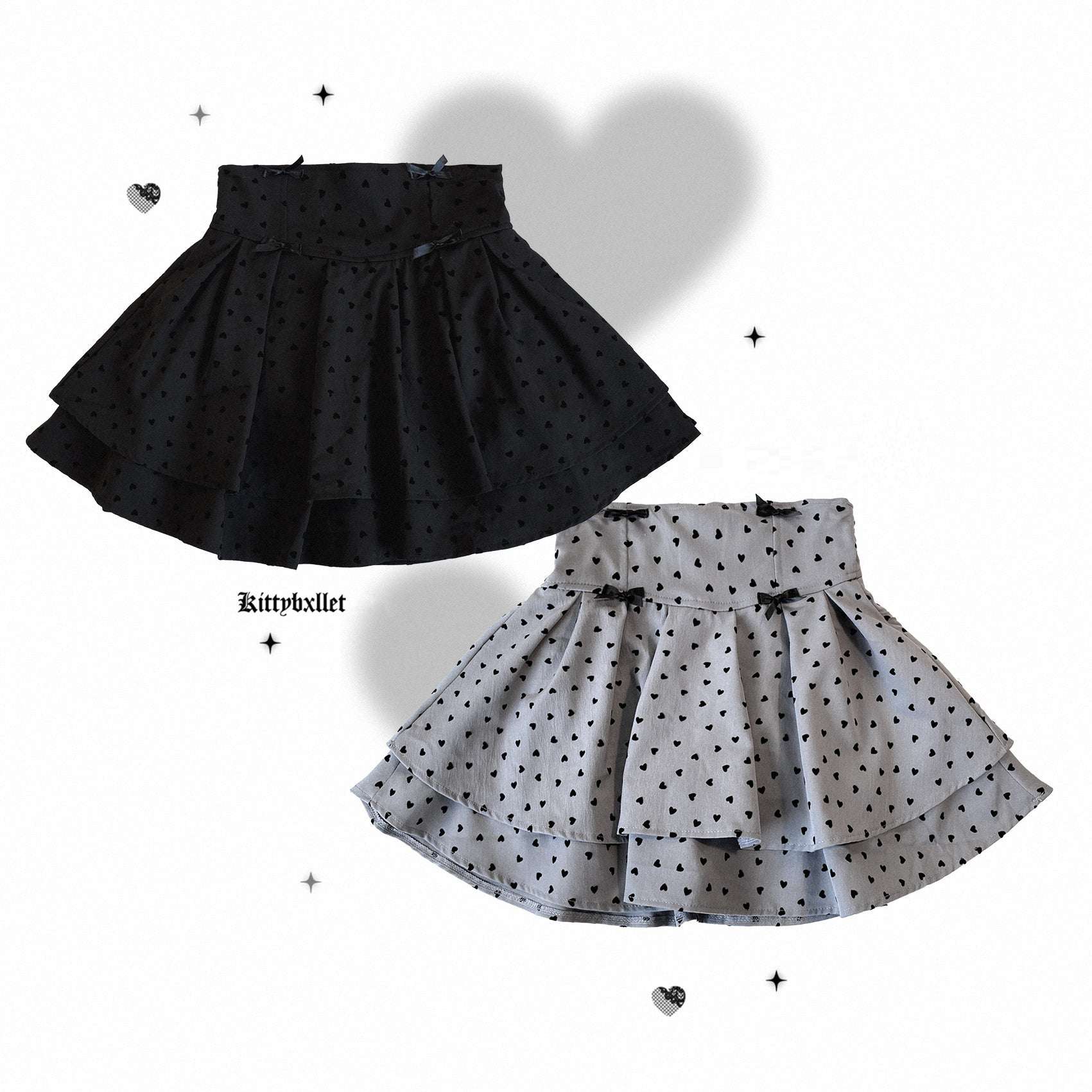 Two polka dot skirts, one black and one gray with black dots, on a white background.