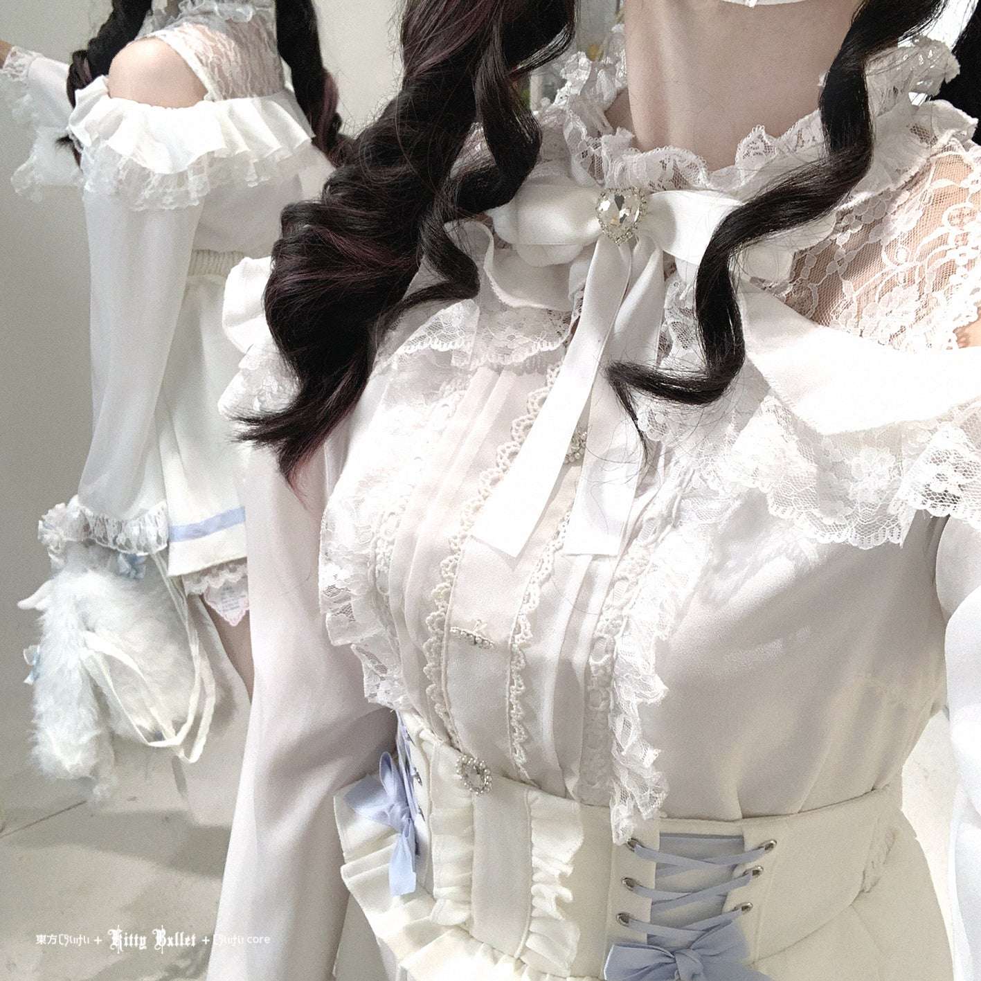 Close-up of a person wearing a detailed white lace outfit in jirai kei style with ruffles.