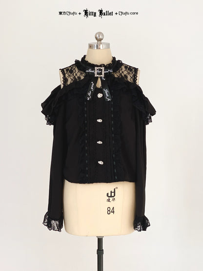 Black lace top in jirai kei style on a mannequin with a plain background