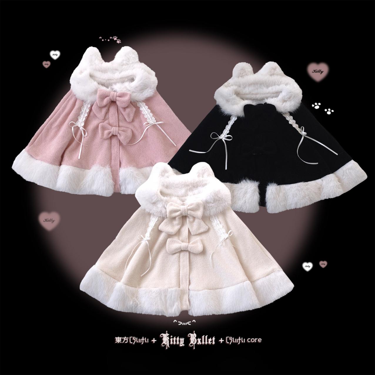 Three winter rabbit ears cape in pink, black, and white with fluffy trim on a dark background.