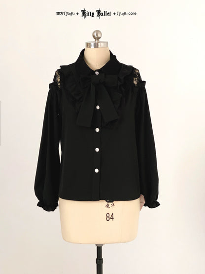 Black jirai kei blouse with ruffled collar on a mannequin against a white background