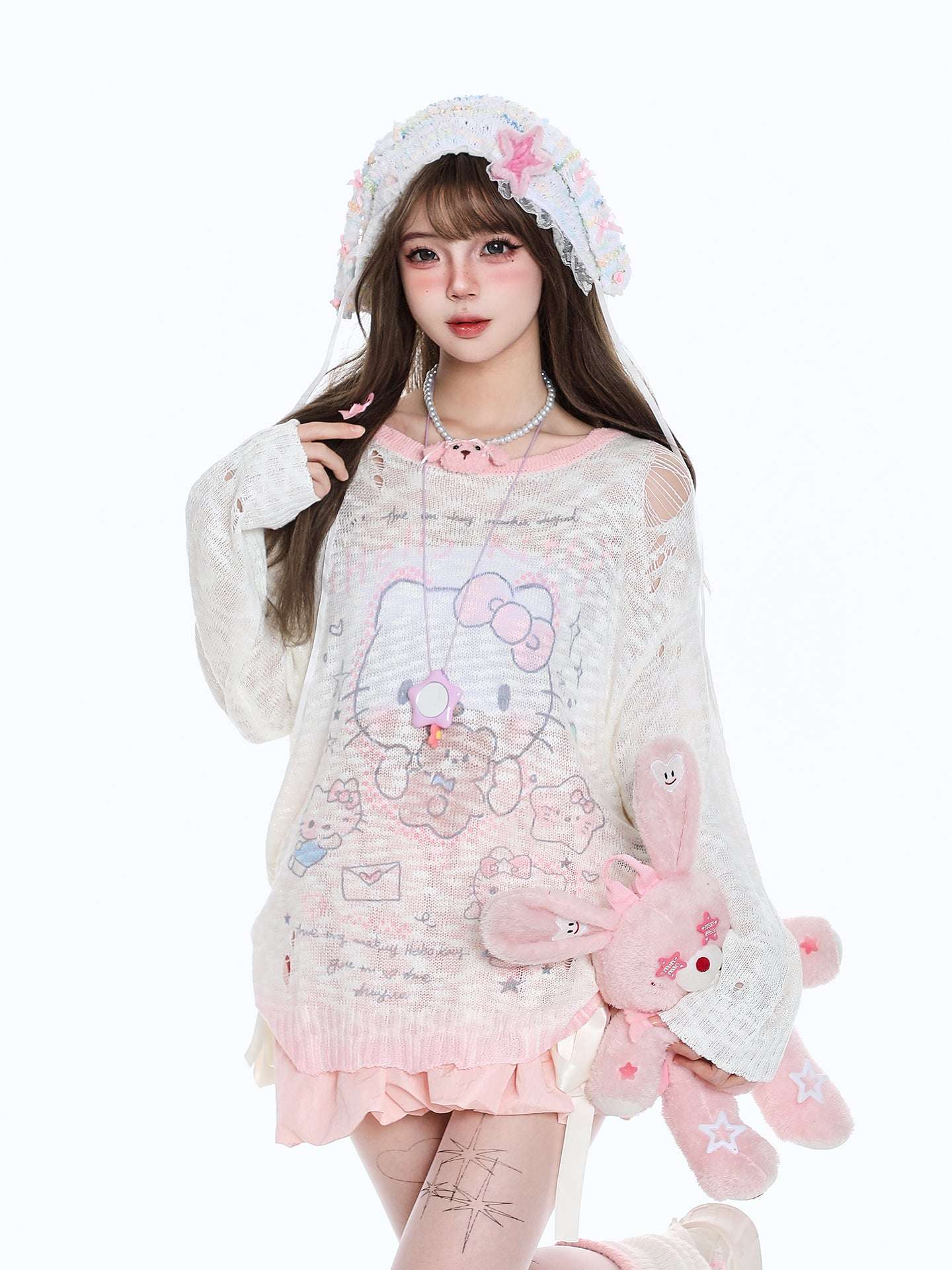 Person wearing a cute outfit with cartoon designs on a white background