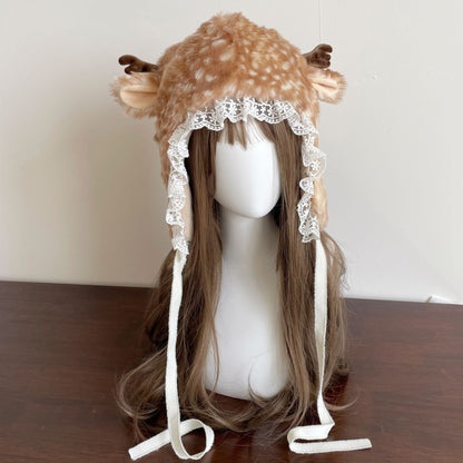 Deer-themed hat with antlers on a mannequin head against a plain background