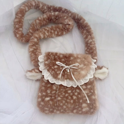 Fluffy brown and white deer-shaped pouch with a bow on a white background
