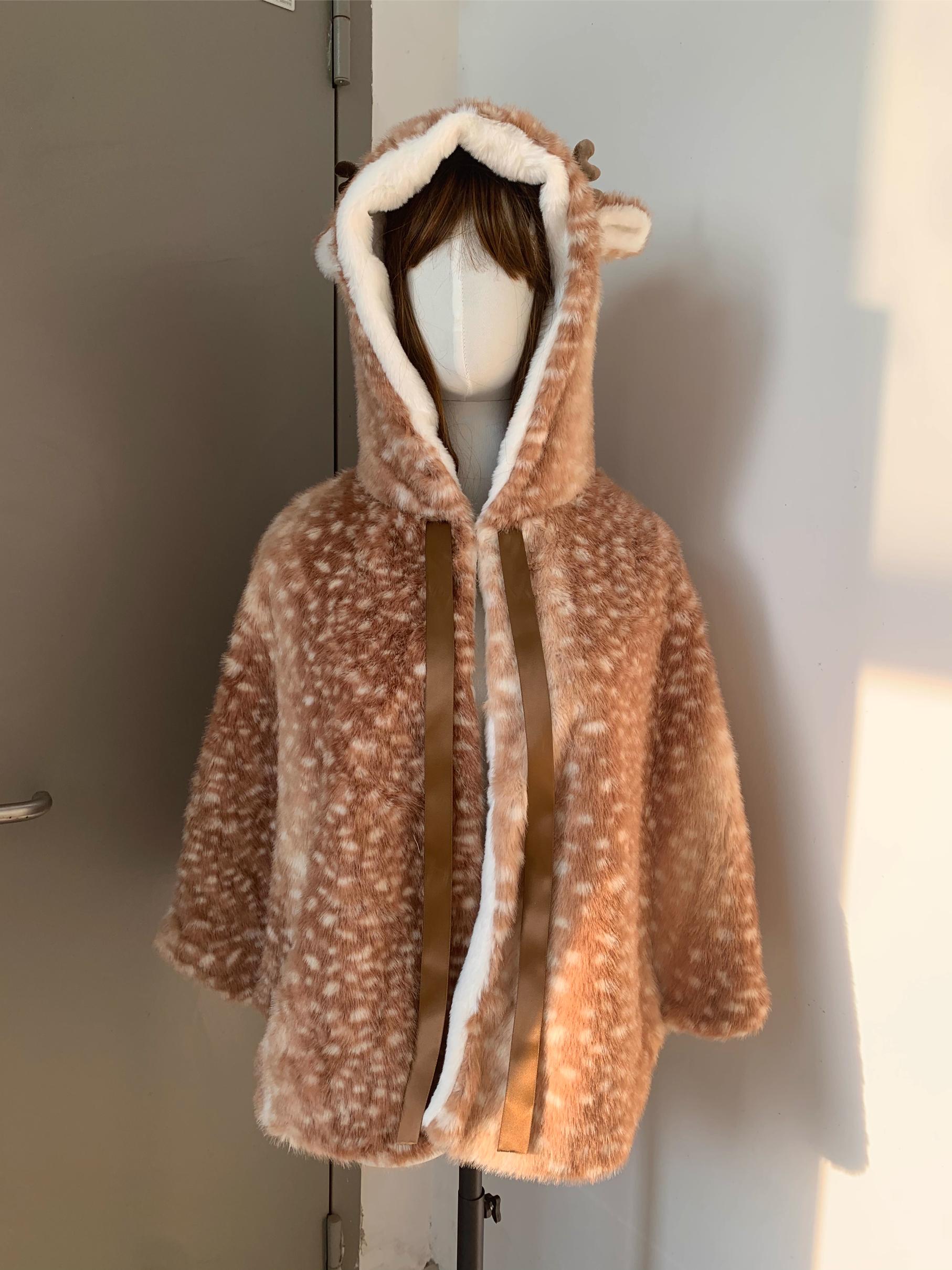 Brown faux fur coat with hood on a mannequin against a neutral wall.
