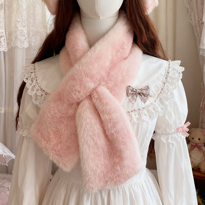 Person wearing a pink fluffy deer pattern scarf with a white lace dress in a soft, blurred indoor setting.