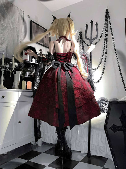 Person wearing a red and black gothic dress with long blonde hair in a room with decorative elements.