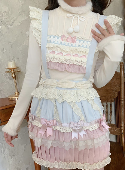 Pastel-colored outfit with ruffles and bows in a room setting