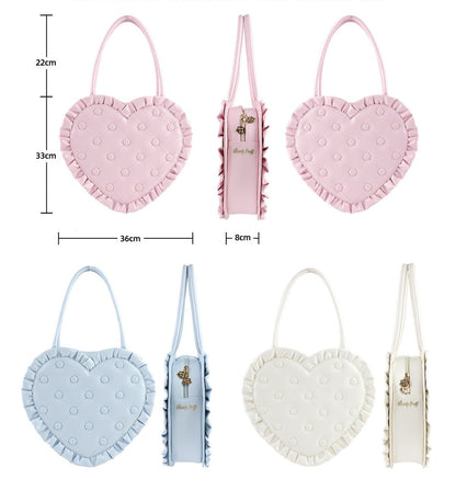 Heart-shaped bags in pink, blue, and white with measurements on a white background
