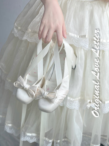 A collection of satin ballet shoes with ribbon wristbands, available in multiple colors including blue, pink, white, black, red, and silver.