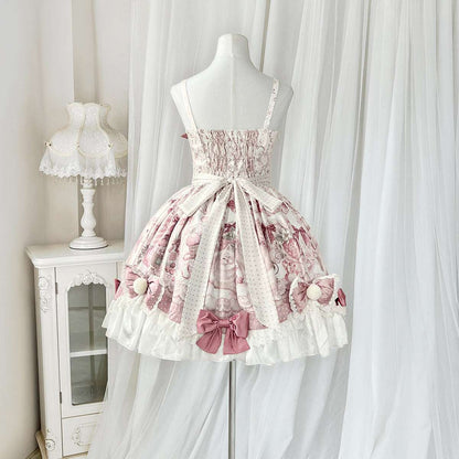 Pink and white floral dress on a mannequin against a white curtain background