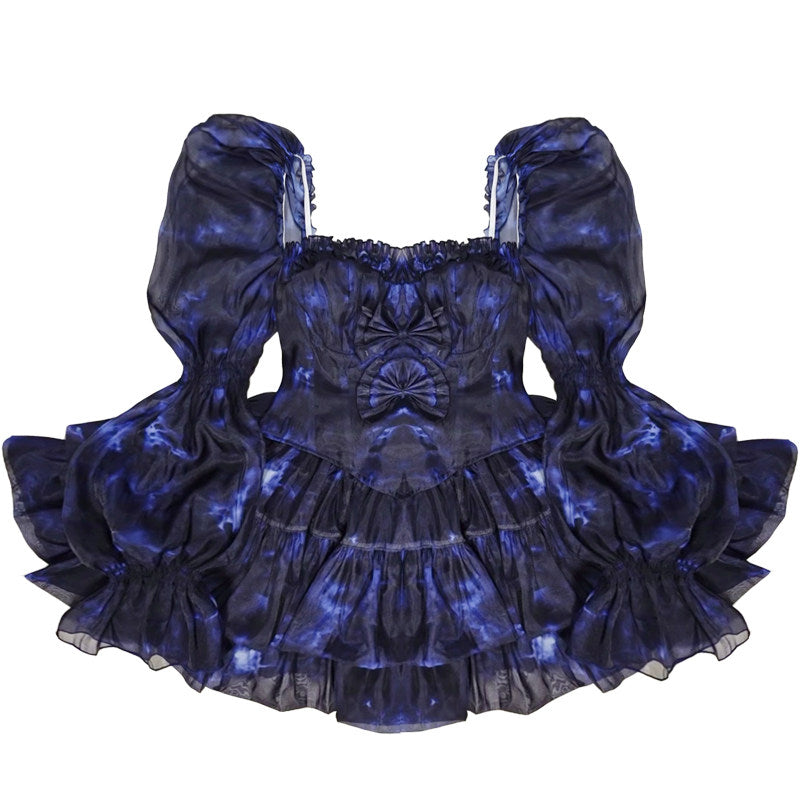 Blue and black ruffled dress on a white background