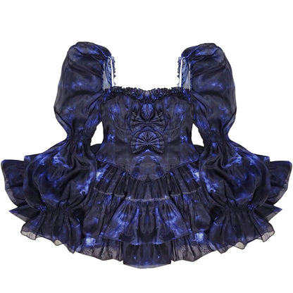 Blue and black ruffled dress on a white background
