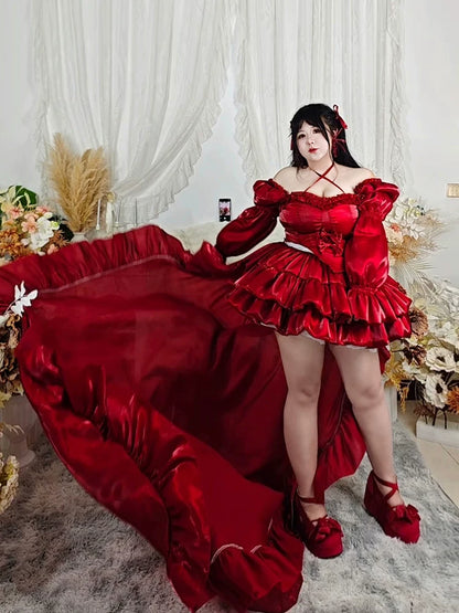 Plus size girl wearing a red dress with ruffles in a decorated room.