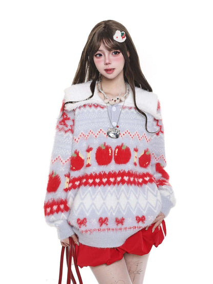 Person wearing a festive sweater with red and white patterns on a white background