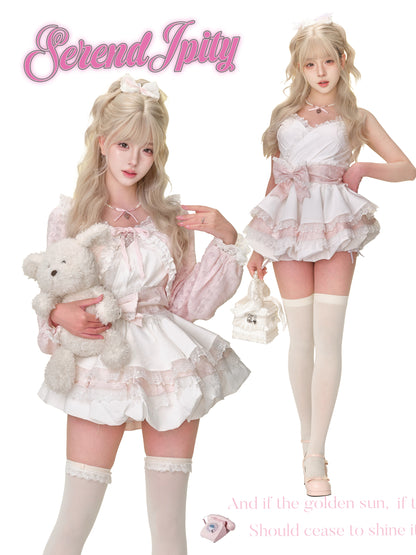 Two women in cute outfits with teddy bear and handbag, wearing white dresses and knee-high socks.