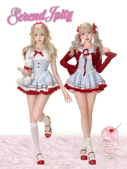 Two dolls in matching outfits on a white background.