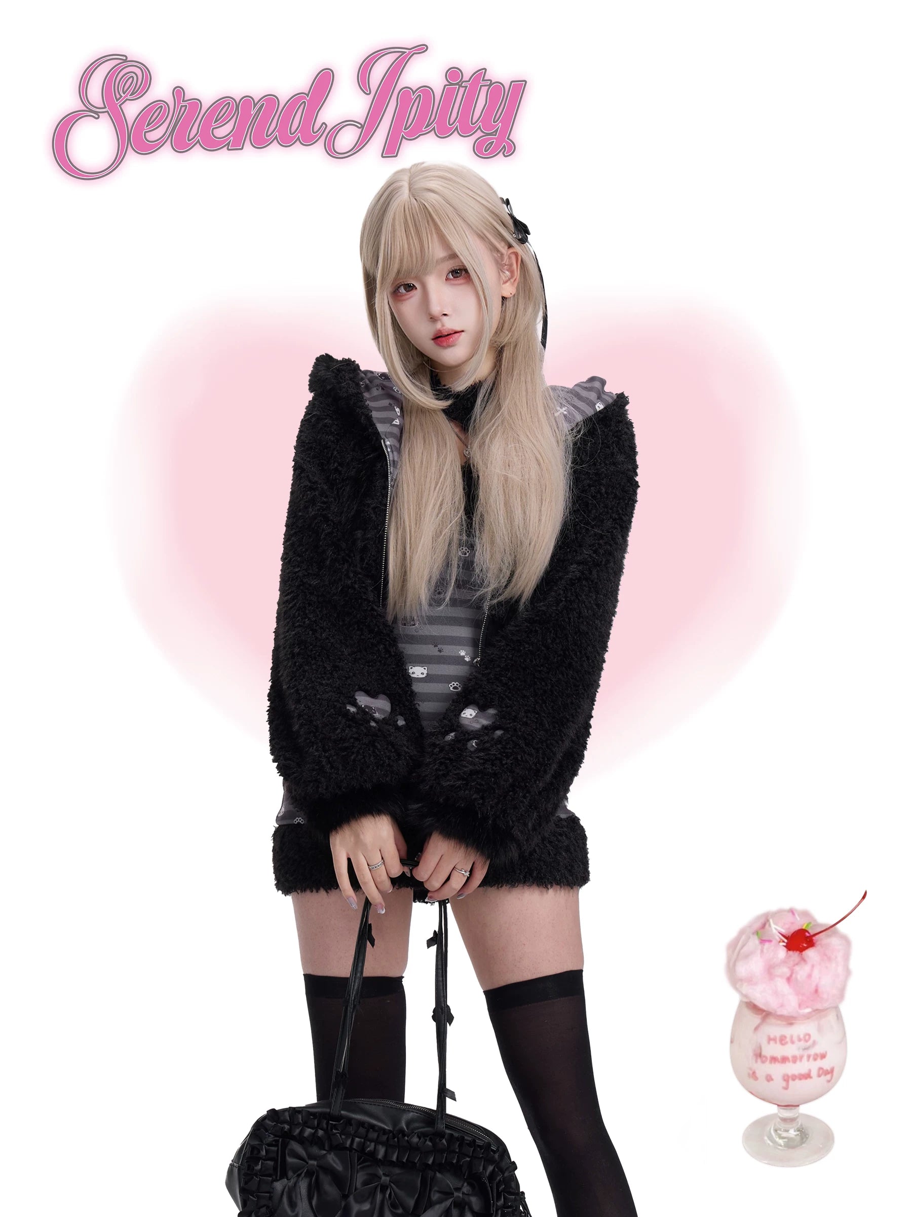 Person wearing a black fluffy coat with a pink background