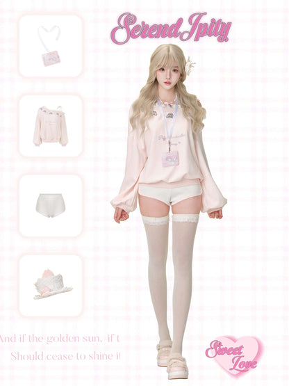 Person wearing a pastel outfit with matching accessories