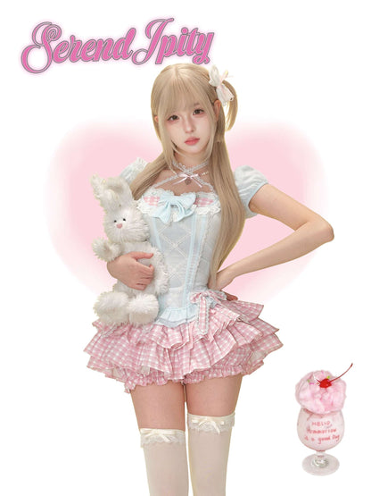 mint-blue puff-sleeve top with white diamond lace and pink plaid bloomers