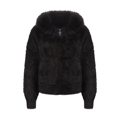 Black fluffy jacket on a white background