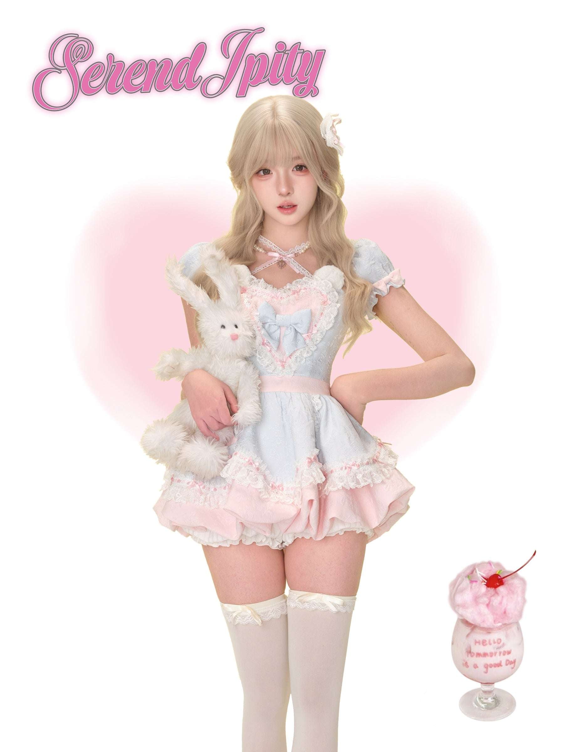 blue dress with pink heart and bear ears design on the chest