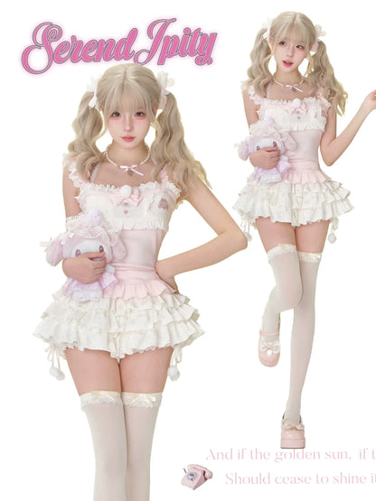 pink and white camisole top with rabbit embroidery and polka dots