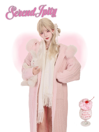 Person wearing a pink outfit with a fluffy white creature, holding a pink drink with a cherry on top, and 'Serendipity' text.
