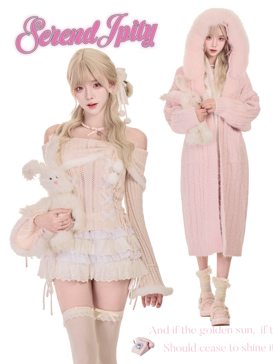 Two people wearing pastel pink and white outfits with 'Serendipity' branding.