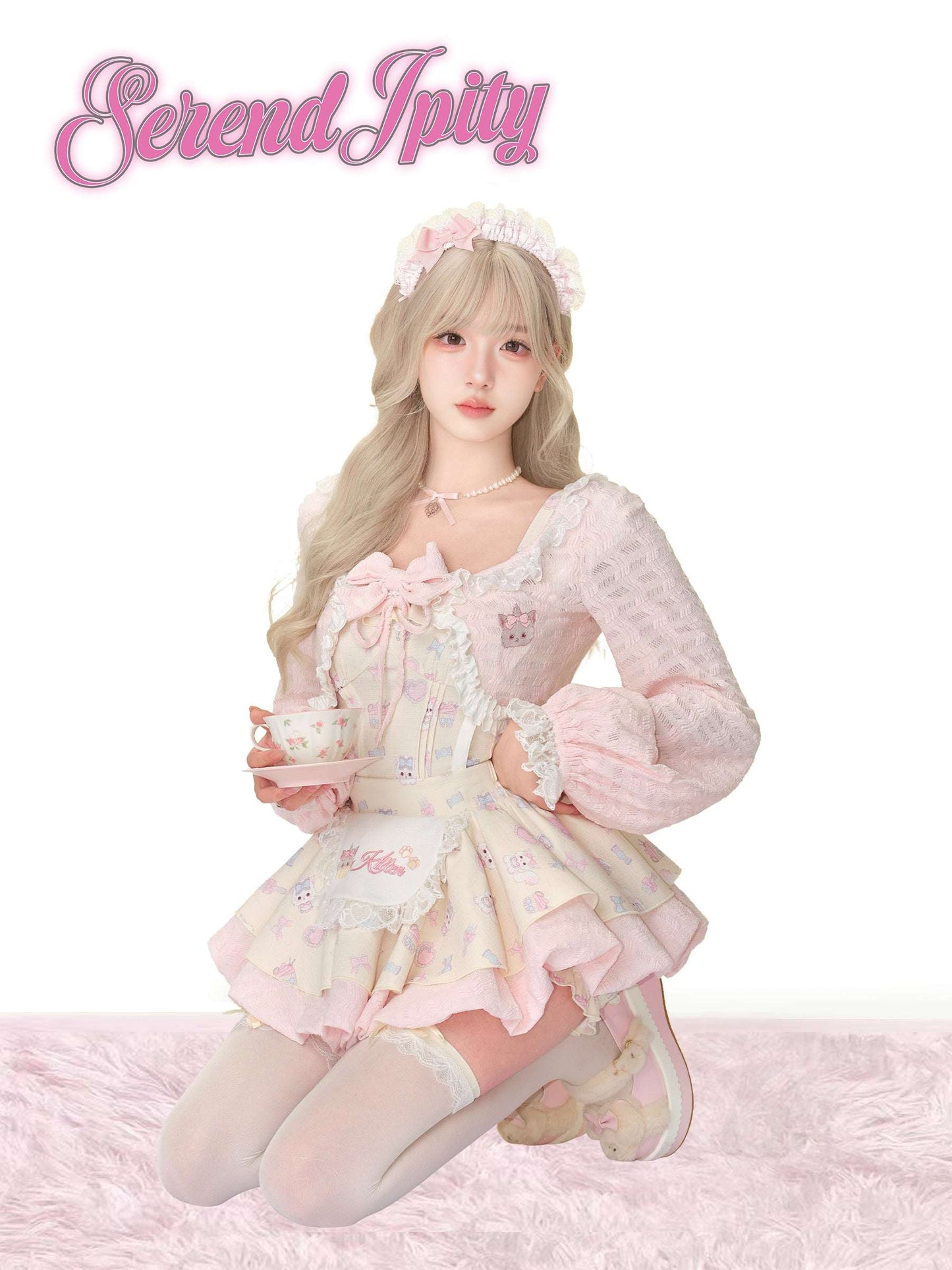 Person wearing a pastel pink and white outfit