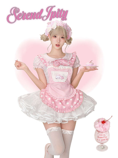 pink gingham apron skirt with cat and cake pattern, paired with white petticoat