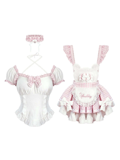 Lolita fashion outfit with top and skirt on a white background