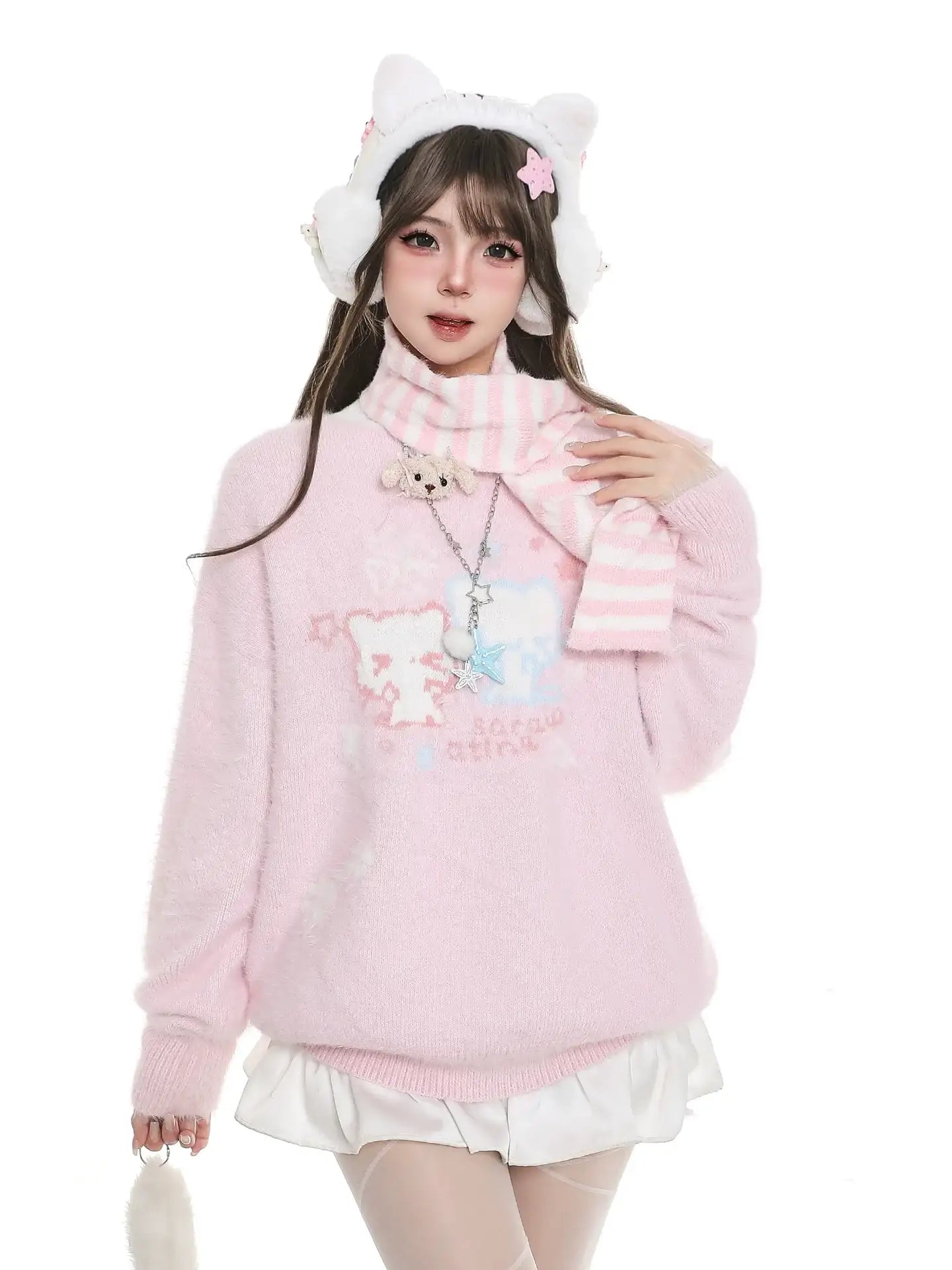 Person wearing a pink sweater with cat ears and a scarf on a white background